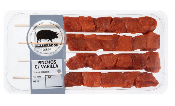 Setas salteadas con pinchos de cerdo.